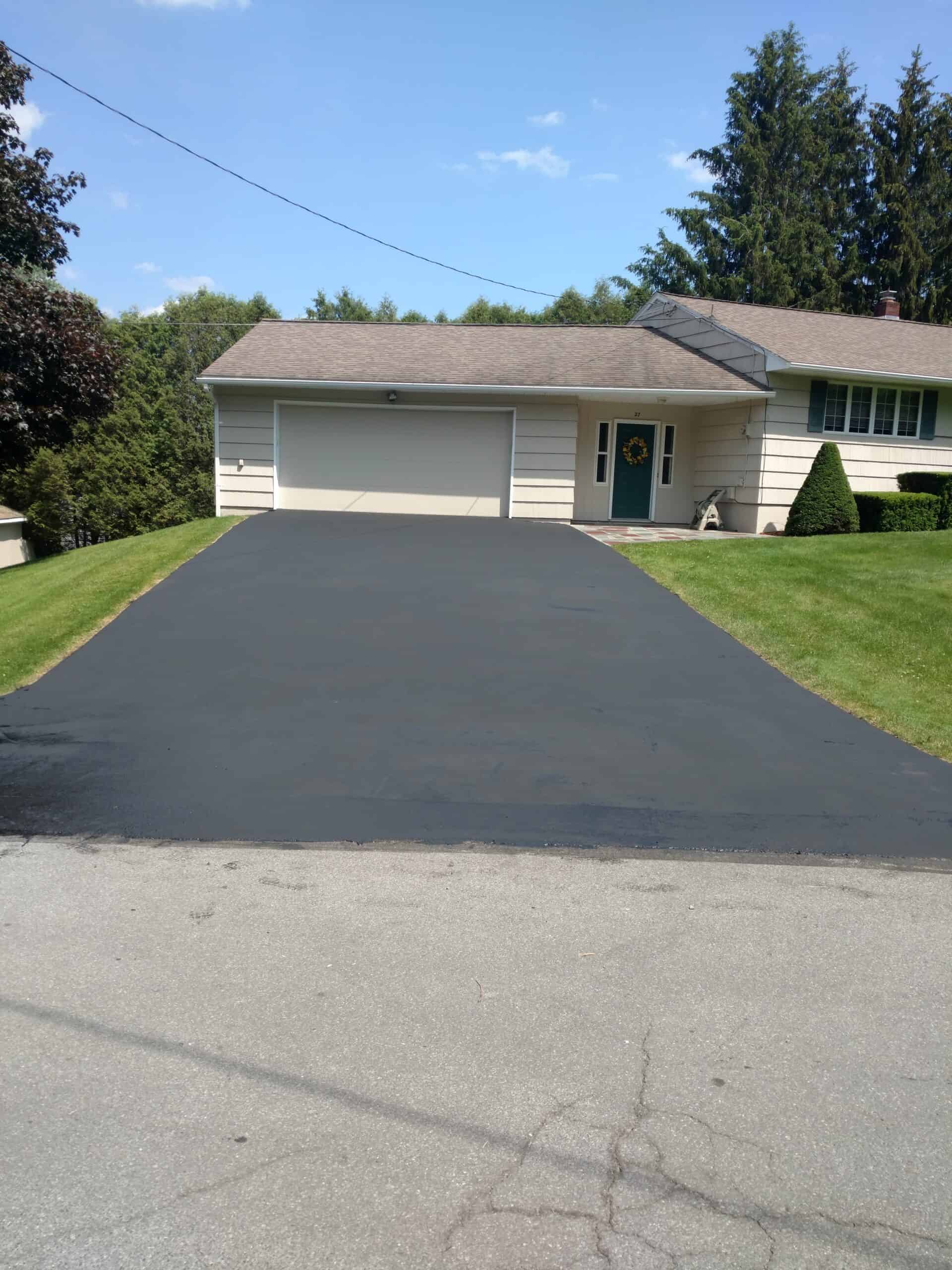 Asphalt sealcoating can add resistance and protection to your Westmoreland, New Hartford, or Clinton driveway! Call Newman Landscaping & Sealcoating today! 